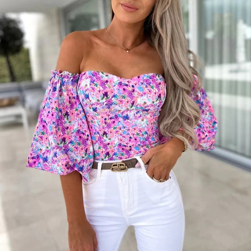 chemises et blouses sexy,chemisier courte fleuris blanche femme nouvelle collection 2024,vêtements femmes tendances 2024,blouse a épaule dénudé manche longue femme,haut dos nus femme elegant chic