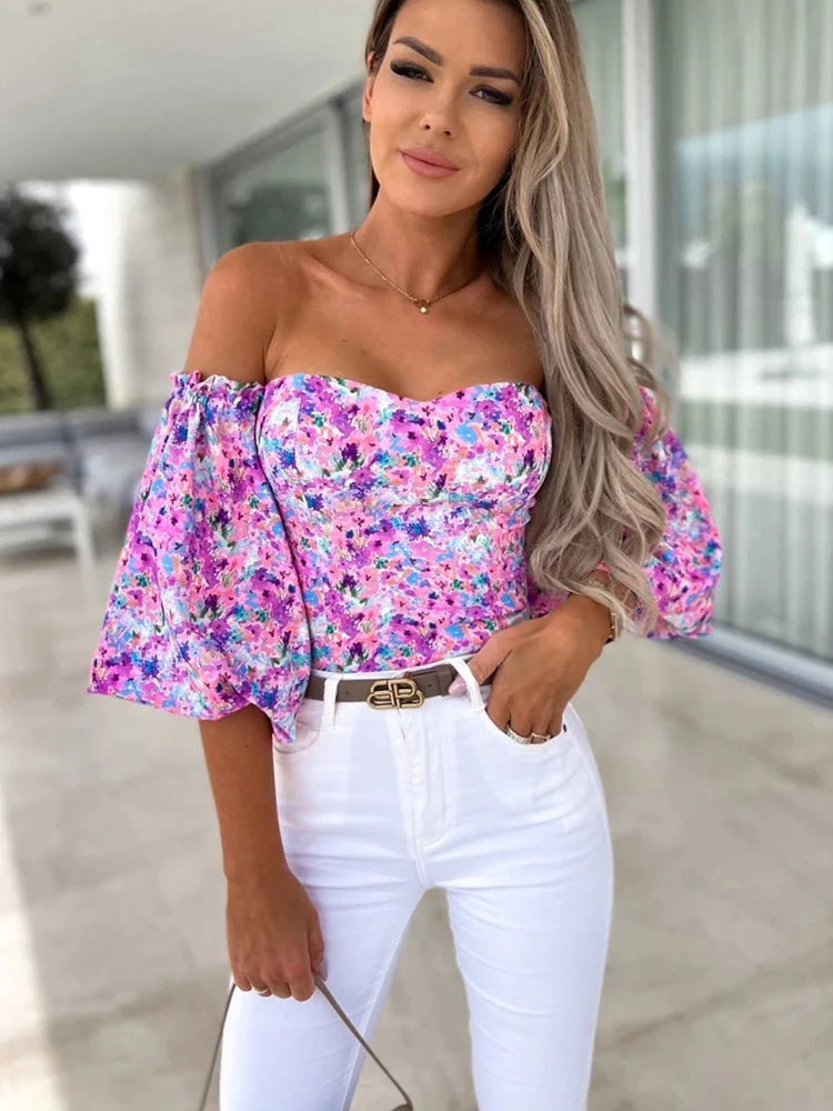 chemises et blouses sexy,chemisier courte fleuris blanche femme nouvelle collection 2024,vêtements femmes tendances 2024,blouse a épaule dénudé manche longue femme,haut dos nus femme elegant chic